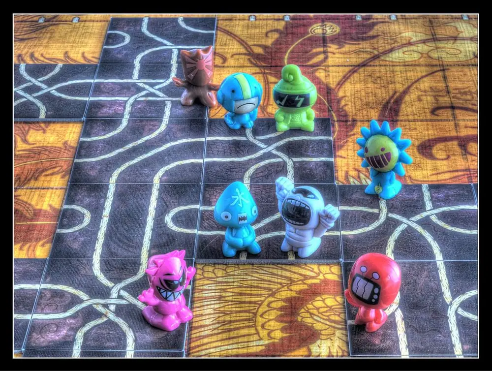 I added these figures the kids gave me instead of using the wooden pawns.