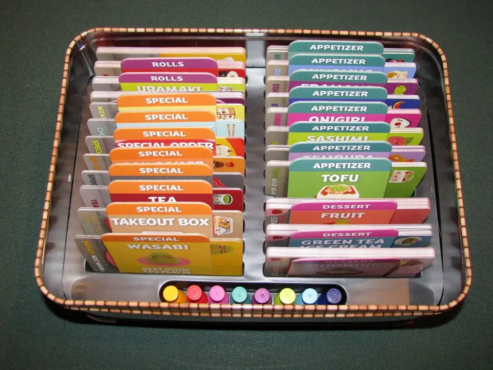 Another way to pack Sushi Go Party! I wish the box was a TINY bit bigger, but you CAN fit the board back in (but its tight)