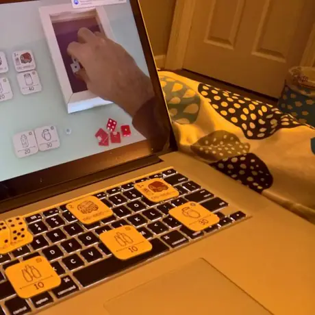 Playing on laptop in bed while watching Rahdo's runthrough