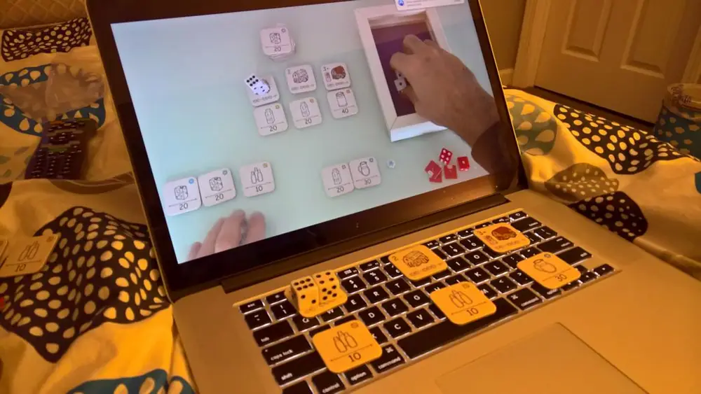Playing on laptop in bed while watching Rahdo's runthrough
