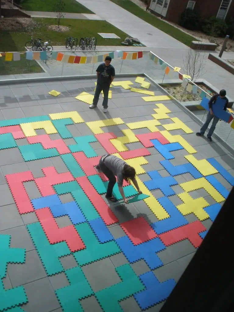 Ginormous blokus, made out of kids' floor mat tiles