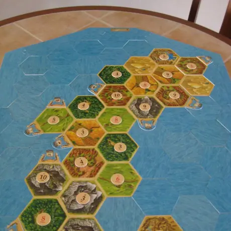 Settlers of Guam with resource tokens