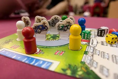 Close up of player markers and start space.