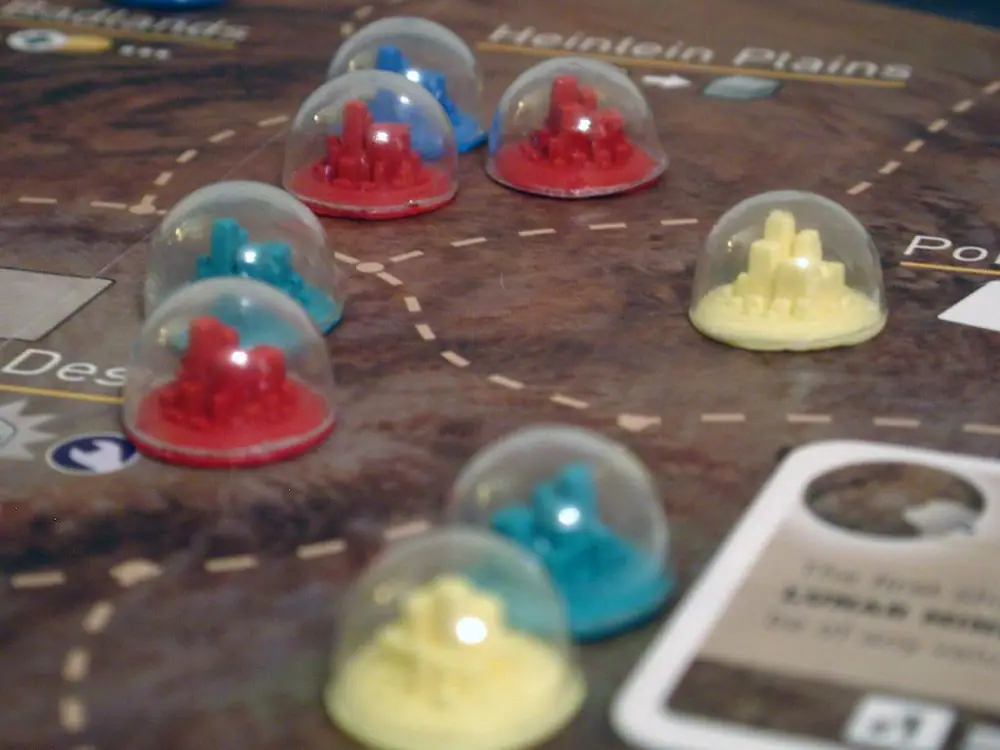 Mid-game with custom pieces that my brother and I made.  Together we molded and cast the city from Fortress America and vacuum formed little domes for each. It was quite a bit of work but worth it!
