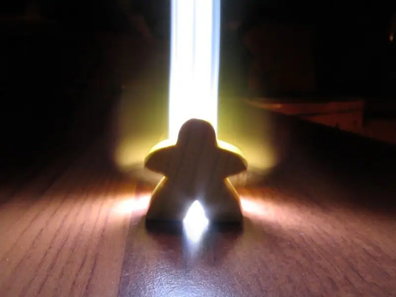 Meeple - Not Photoshopped, effect produced with LED lamp.