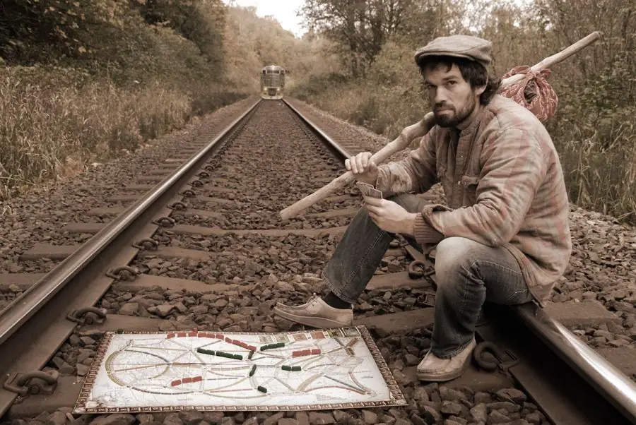 A quick game of Ticket to Ride while waiting for a train to hop.