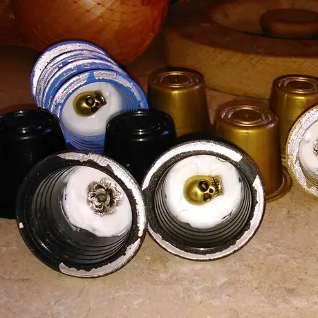 HandMade with recycled coffee pods, tibetan trinkets and silicone sealant.