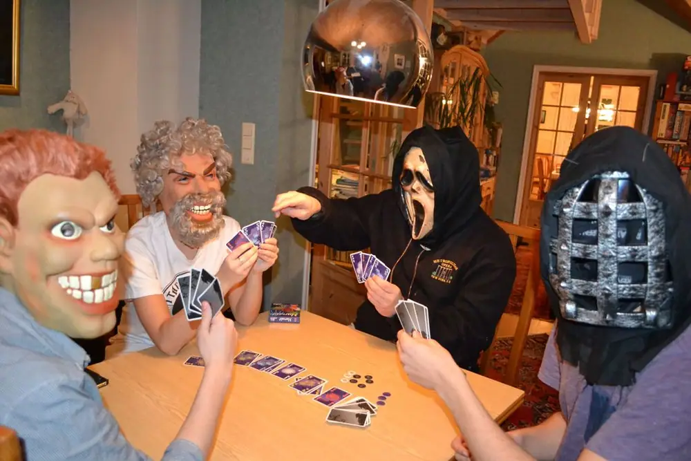 We had so much trouble avoiding facial hints that we tried playing with masks...